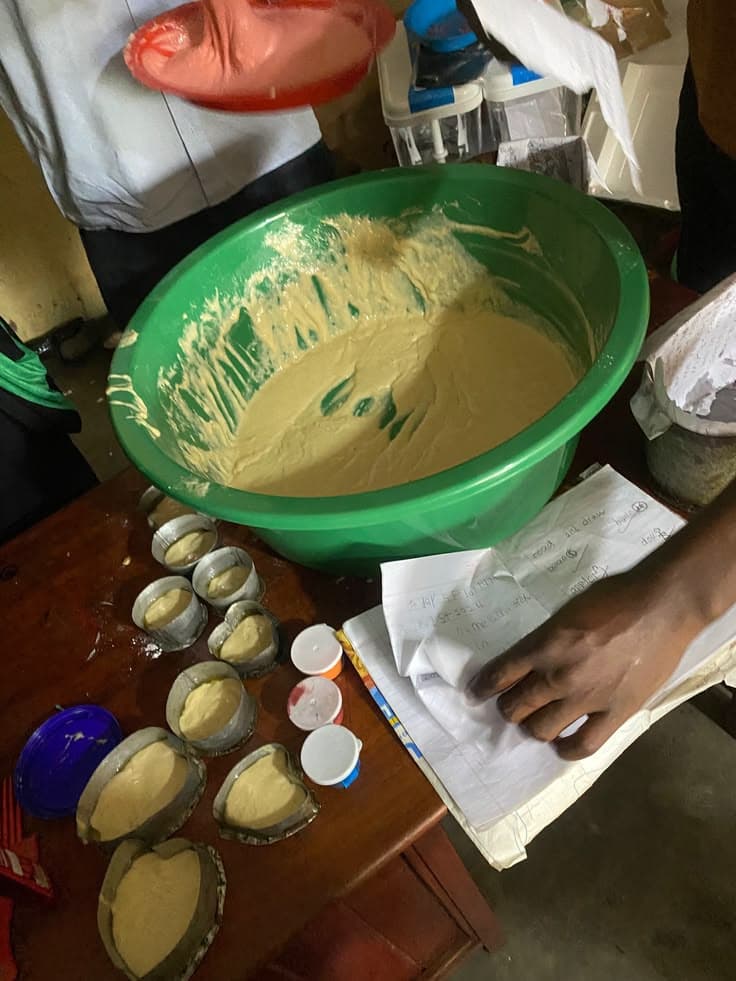 Youth and parents learning cake decoration and bakery skills